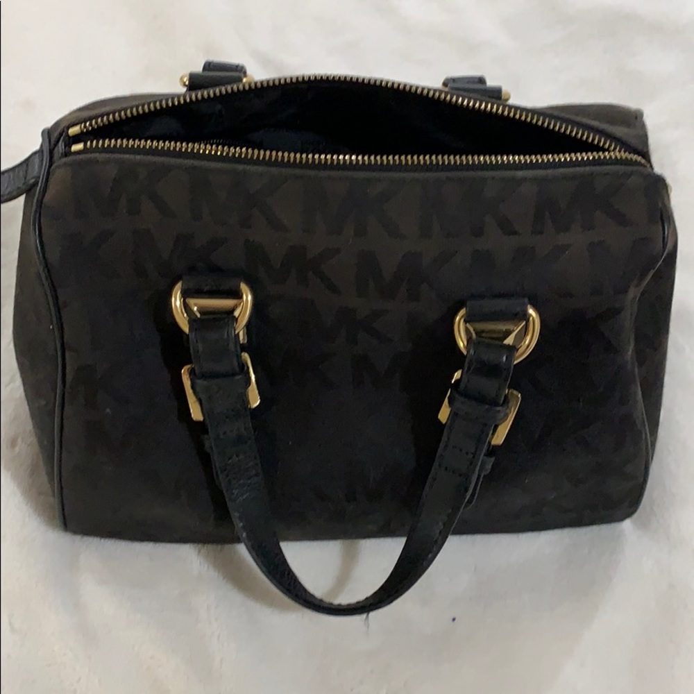 MICHAEL KORS handbag.  Stain on bottom- see pic